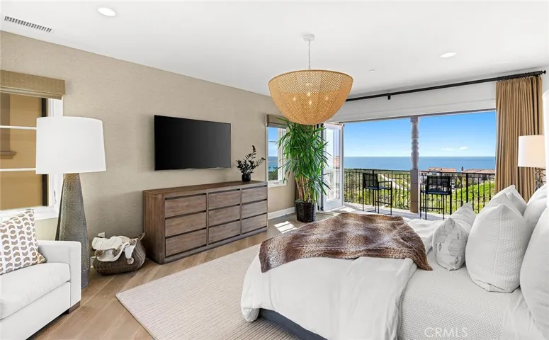 Primary suite with amazing ocean, sunset, whitewater, SC Island, coastline, and nature preserve views.