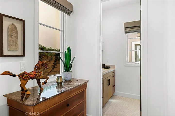 Downstairs junior primary bath with walk-in closet.