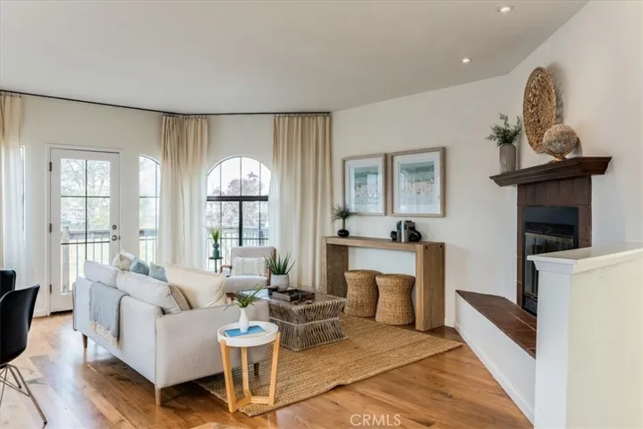 Bright living room upstairs with views of Morro Rock.