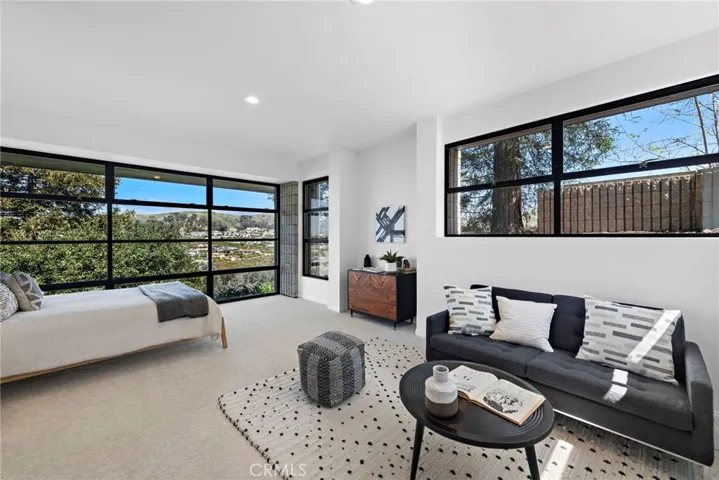 Downstairs Bedroom #2 with expansive views and tons of natural light