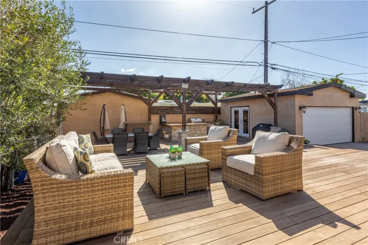 The French doors from the living room lead to this amazing deck made from gorgeous IPE wood. Entertainers' dream area.