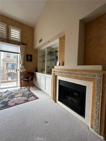 Fireplace and builtins with shelves