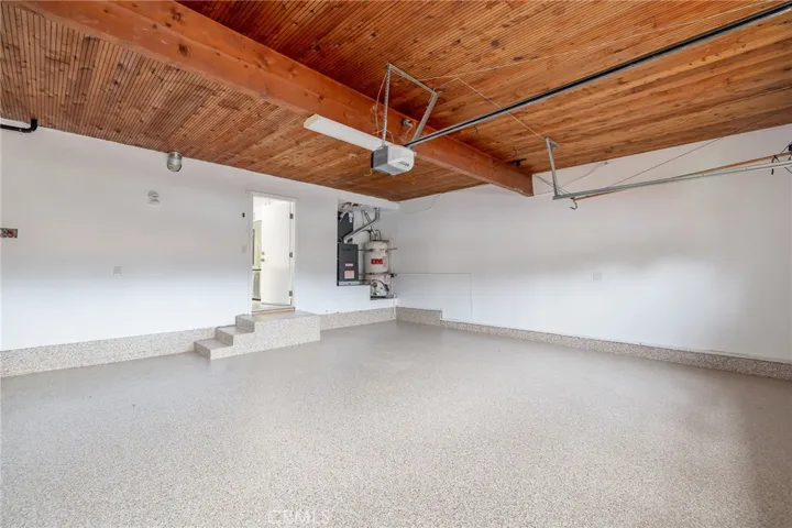Finished garage with drywalls and epoxy flooring