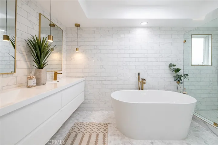 Double sink and skylight in master bath