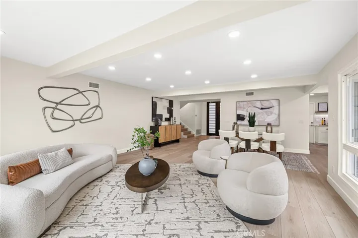 From this level, only a few steps up going to the bedrooms and a few steps down accessing the family room, outside