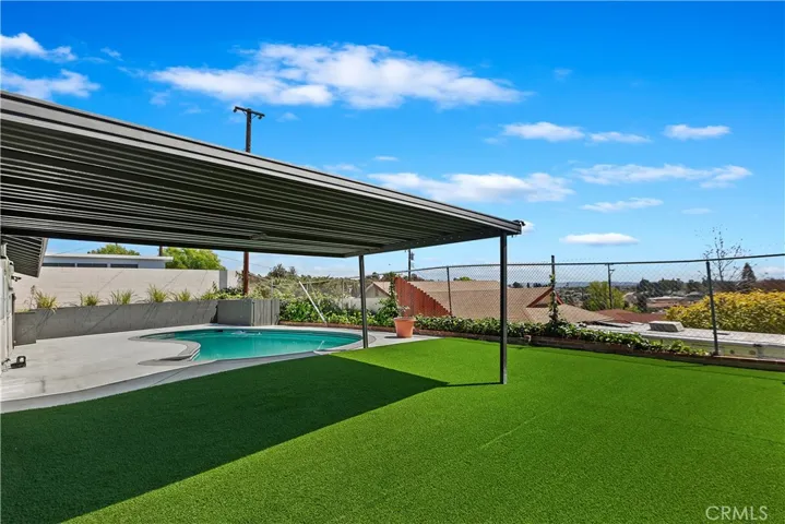 Step into your own private oasis, where a sparkling pool invites you to unwind and bask in the California sun. Lounge on the expansive deck or take a refreshing dip while enjoying the  views stretching beyond the horizon.