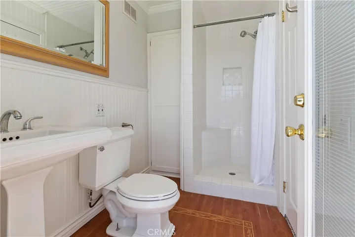 But the true highlight of this master bathroom is its seamless access to the backyard pool. A set of elegant Louvered door opens onto a private patio, where you can bask in the sunshine and enjoy easy access to the shimmering waters of the pool beyond. Whether you're starting your day with a refreshing swim or unwinding with a leisurely dip in the evening, this direct connection to the outdoor oasis ensures that every moment spent in the master bathroom is infused with a sense of luxury and tranquility.
