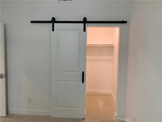3rd bedroom on 1st floor with closet