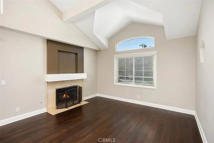 Appreciate the newer windows, updated baseboards, custom/neutral paint, and a fireplace for cozy ambiance
