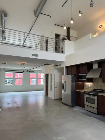 view of kitchen and living room from loft