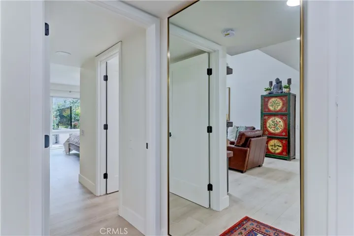 HALLWAY TO PRIMARY BEDROOM