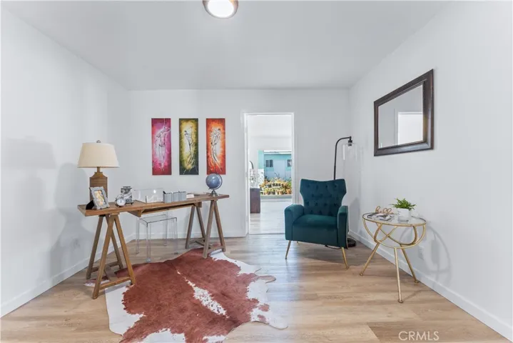 Originally the 3rd bedroom in the house however staged as an office as it has the doorway to access the primary bedroom