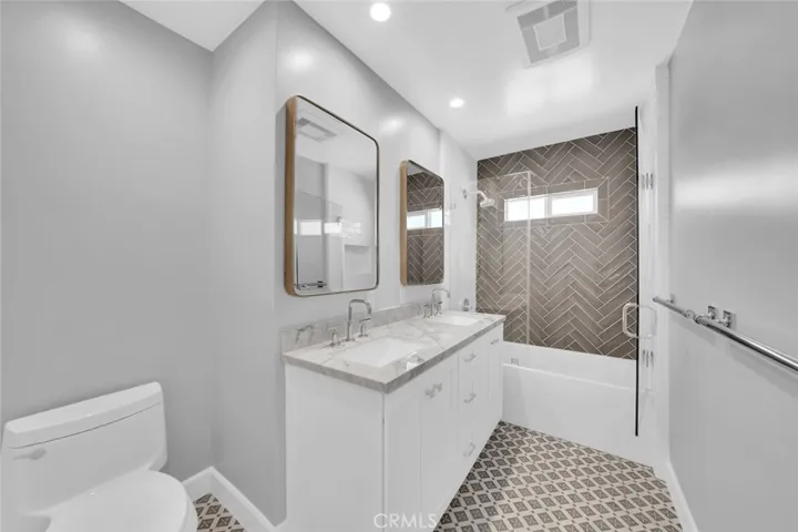 Completely Remodeled Guest Bathroom w/ Soaking Tub and Custom Tile Work.