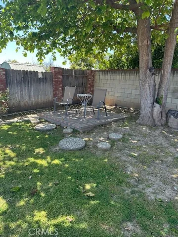 Relax under the large Shade Tree during the hot summer