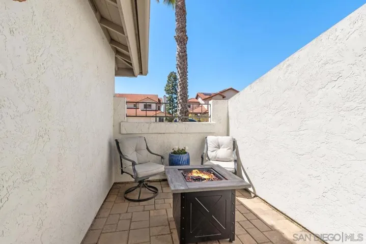 Fully fenced front patio with direct access from Breakfast Area/Kitchen.