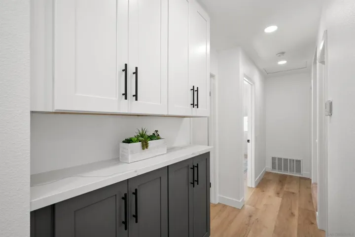 Beautiful matching cabinetry in the hallway.