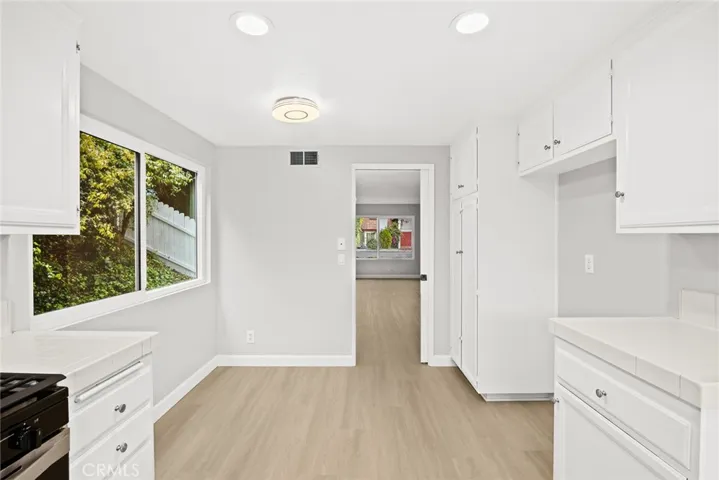 There is a breakfast nook in the kitchen