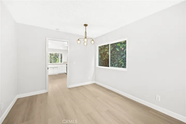 Dining room with glass bubble chandelier