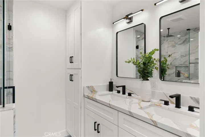 Redesigned & upgraded downstairs ensuite primary bathroom