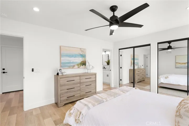 A view of the downstairs primary bedroom towards the ensuite bathroom