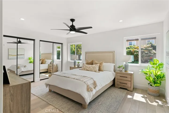 ahhh, this massive, downstairs, primary bedroom features 2 double door closets and loads of space