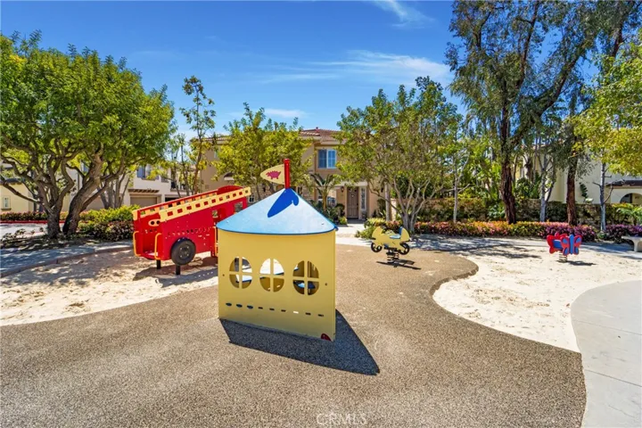 This tot lot provides space for play or just open space as you walk out.