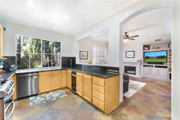 Kitchen opens to the living room and out to the backyard!