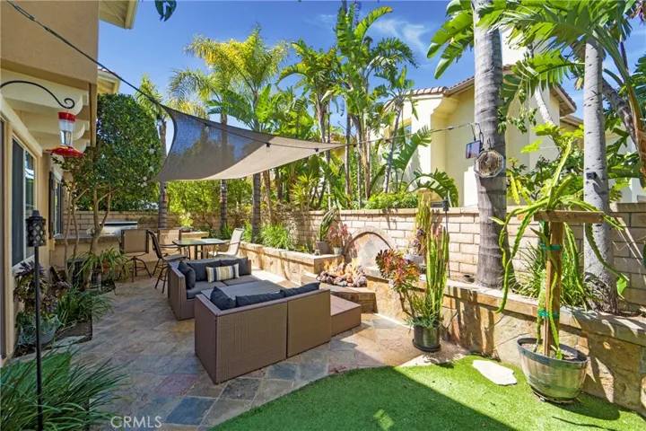 The backyard beckons entertainers and relaxers alike!