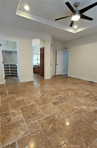 Primary suite, left side entry to ensuite and walk in closet