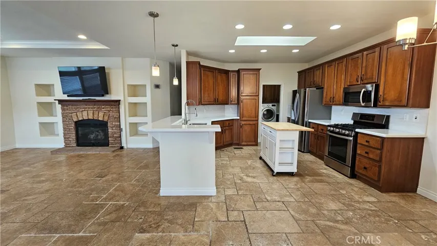 enter to the open living room and kitchen