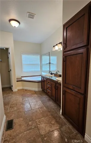 Primary suite bathroom storage