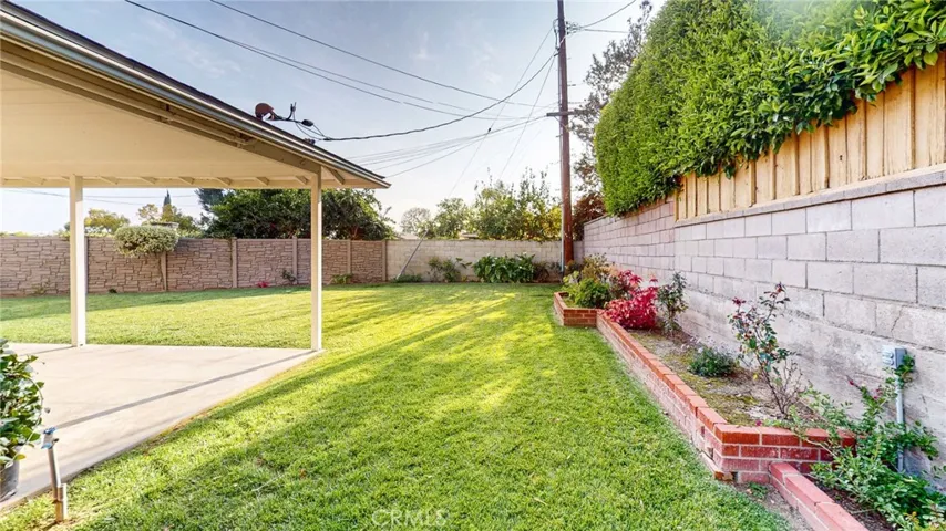 BACKYARD VIEW OF NORTH SIDE OF YARD