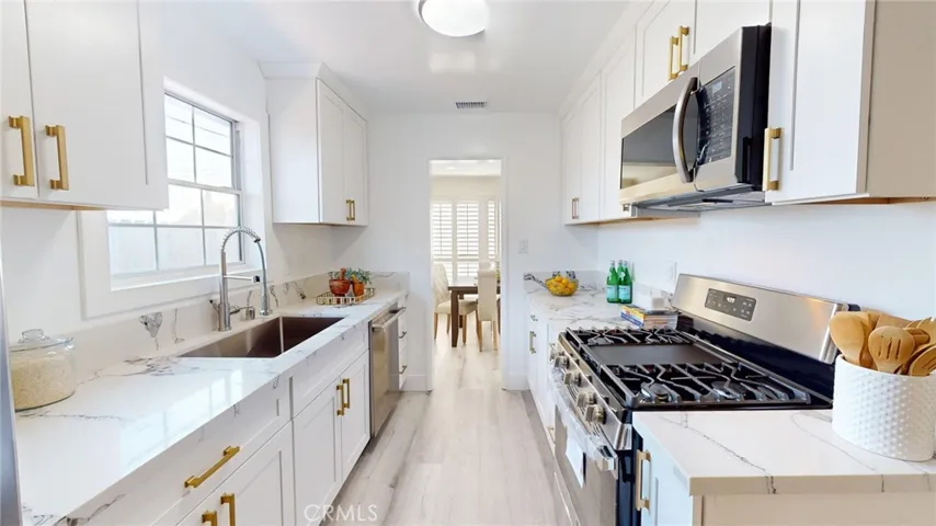 KITCHEN FULL VIEW TO DINING ROOM