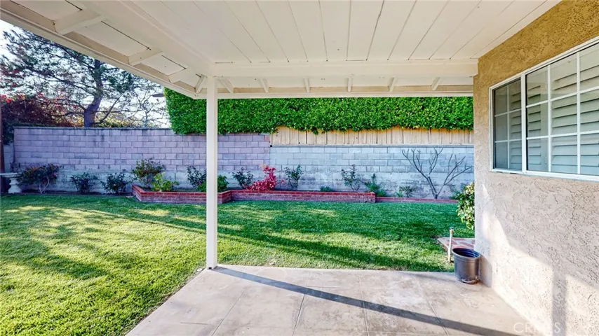 BACKYARD VIEW TO SIDE YARD