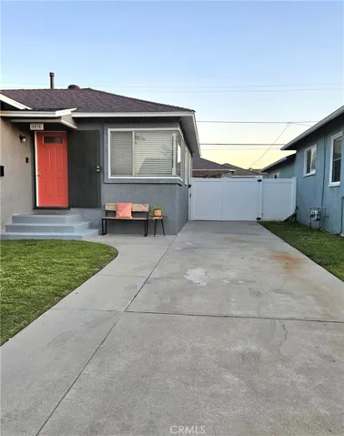 long driveway, gated to garage area