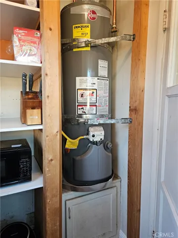 newer water heater, storage shelves