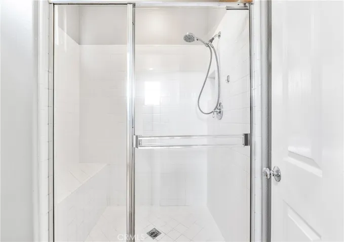 Separate tub and shower in the primary bathroom