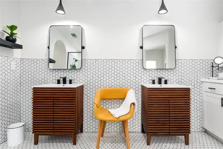 Separate vanities with additional built-in storage