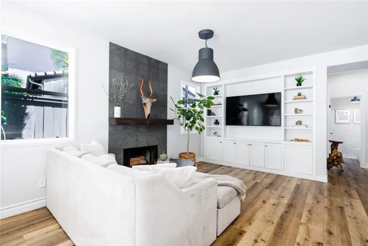 Family room with fireplace and built-in entertainment center