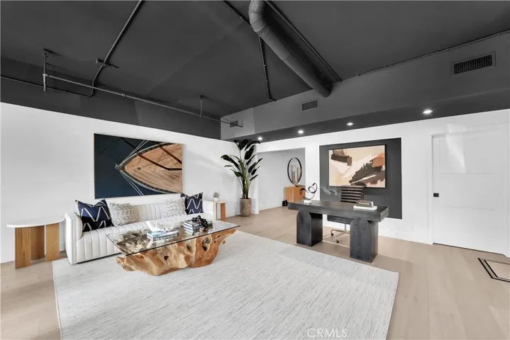 SOARING CEILING IN LARGE RETAIL SPACE - New Lighting and windows