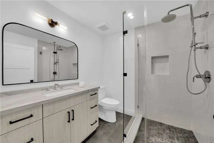 DOWNSTAIRS FULL BATH IN RETAIL AREA