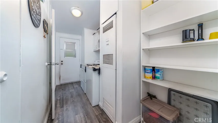Conveniently located inside, washer and dryer adjacent to the pantry.
