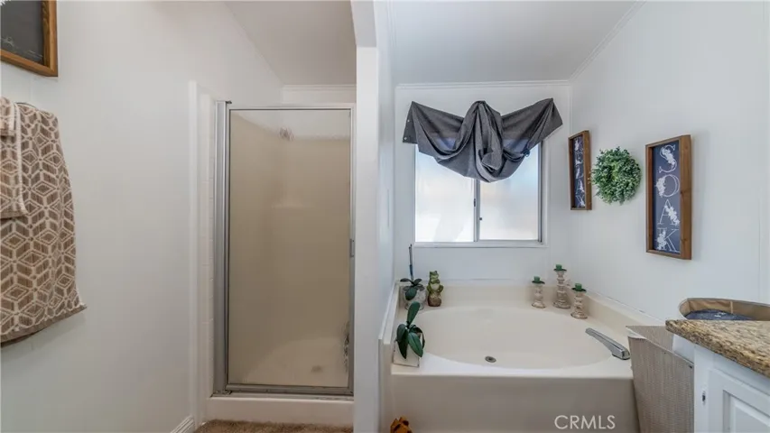 Grand bathroom with soaking tub.
