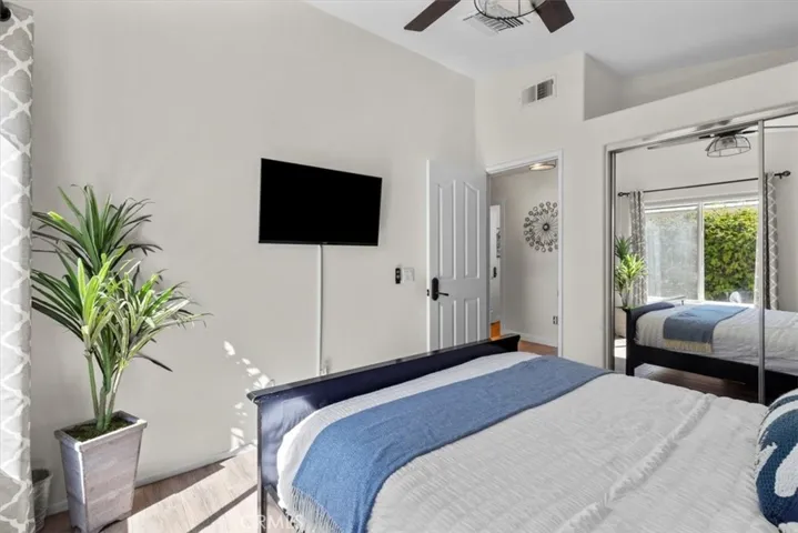 Bedroom #3 with mirrored closet.