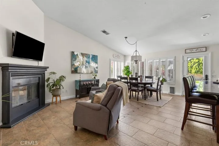 Open concept living with kitchen, dining and living space all joined together, with easy access to the backyard through the french door.
