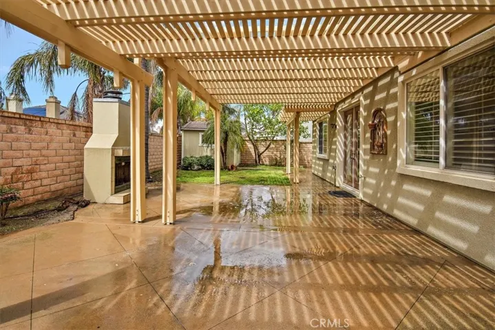 Great backyard with a patio.
