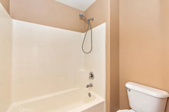 Separate tub/shower area.