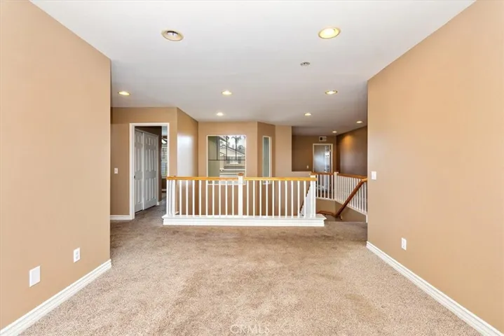 2nd floor entertainment area. Could be an addition bedroom.