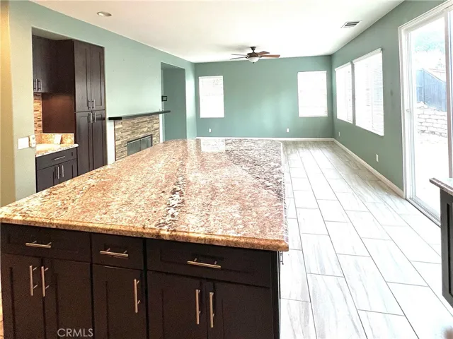 view of large island and back family room