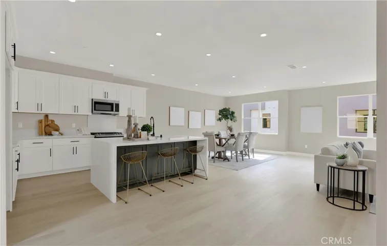 Kitchen with Large Waterfall Island